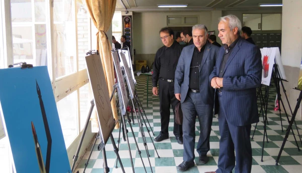 برگزاری نمایشگاه عکس و آثار گرافیکی با موضوع ایثار و شهادت